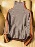 Margot striped turtleneck sweater in orange