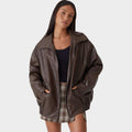 Sienna oversized faux leather bomber jacket in brown